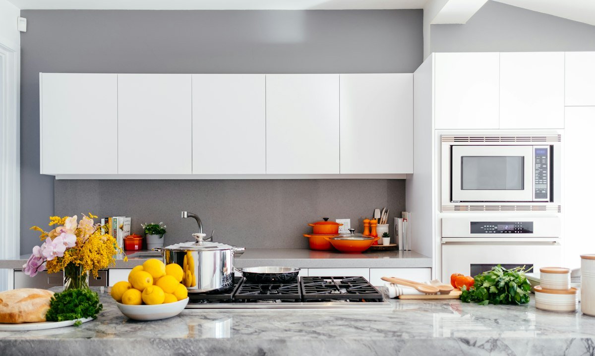 Kitchen with built-in oven and hob